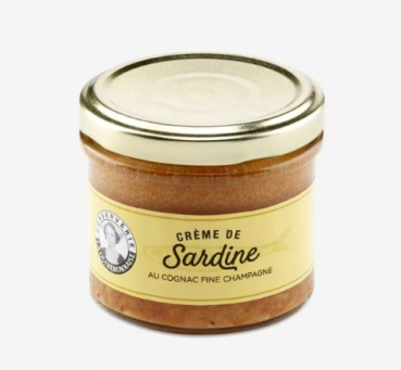 Sardinencreme mit Champagner – Glas geöffnet, Brotaufstrich daneben