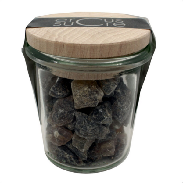 Glas mit braunen Kandiskristallen von Ercus und Holzdeckel